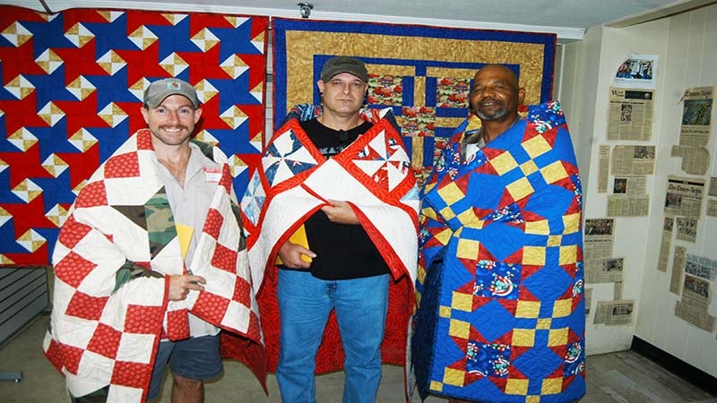 Army Veterans Presented With Quilt Of Valor